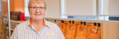 A banner showing an image of a Lowtons woman employee.